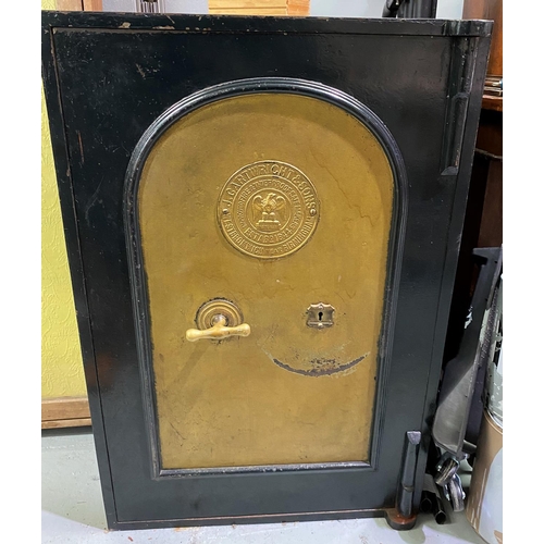 483A - A large vintage safe by J Cartwright & Sons 'Improved Fire & Theft Proof Safemakers West Bromwich, N... 