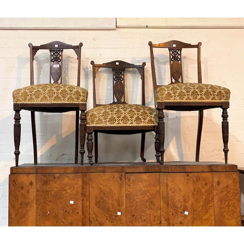 510 - An Edwardian pair of inlaid mahogany dining chairs; a similar nursing chair; a pair of mahogany salo... 