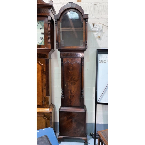 513 - A Georgian mahogany longcase clock case, the arched hood with fretwork pediment and turned side colu... 