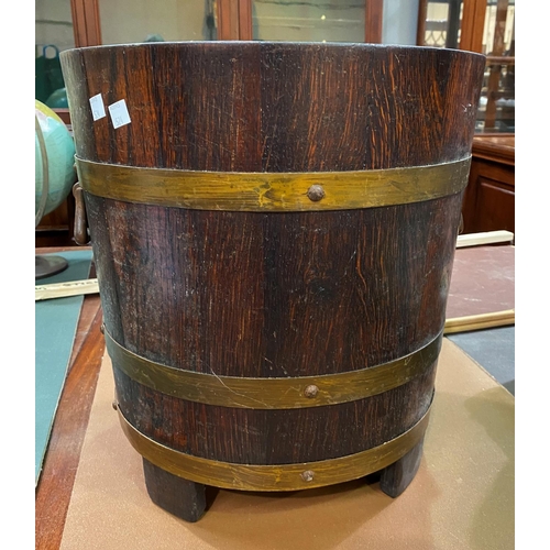 524 - A brass bound oak log bucket, height 38 cm