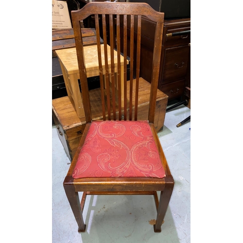 649 - A 1920's set of 4 mahogany dining chairs with rail backs