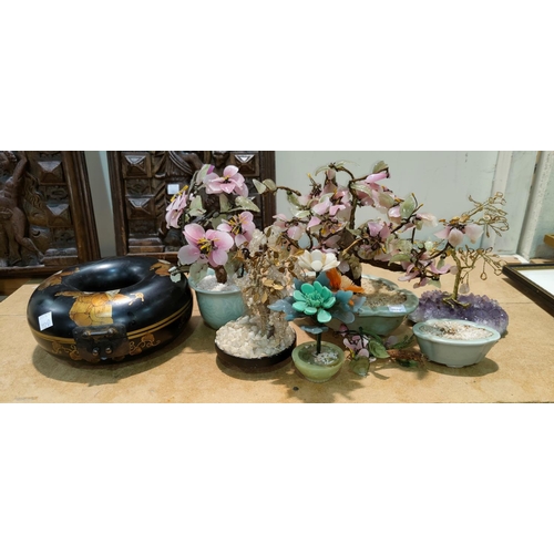 152D - A modern Japanese lacquer style circular box, stone bonsai trees