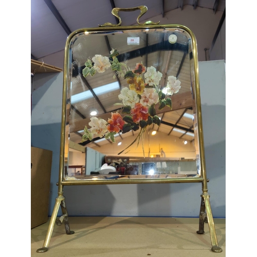 20 - An Edwardian brass firescreen with painted mirror panel