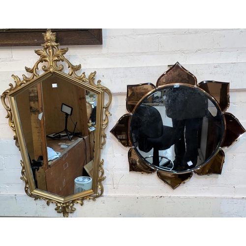 31 - A flower head mirror in peach glass frame; a gilt framed mirror