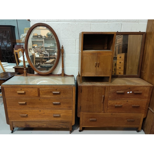 467 - An Arts and Crafts style oak bedroom suite comprising dressing table 99cm, washstand 99cm and a beds... 