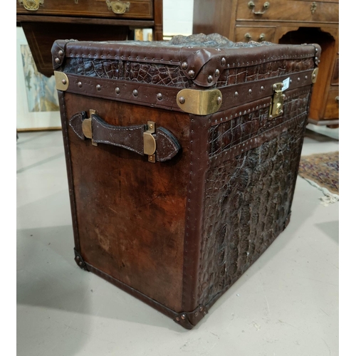 145 - A Colonial style travel trunk covered in crocodile skin effect
