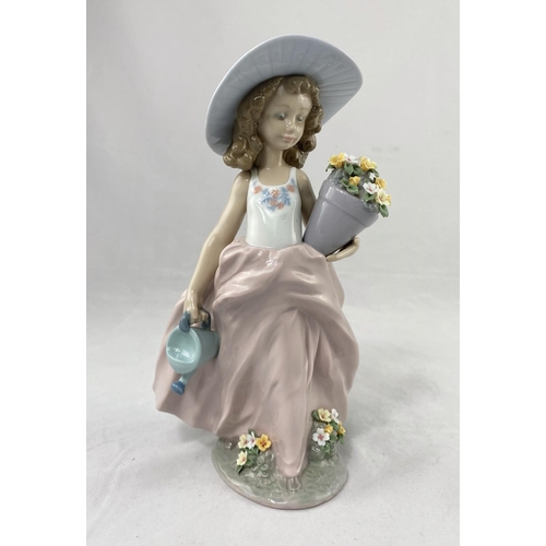 221 - A Lladro Society figure:  girl with pot of flowers, height 22 cm