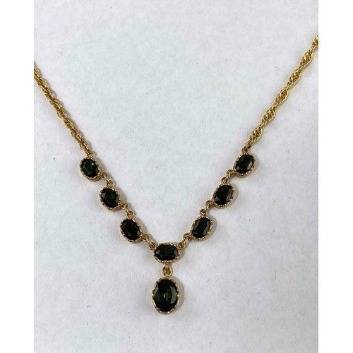 289 - A Tourmaline set yellow metal necklace with 6 oval stones and a drop, stamped '375' weight 9gms