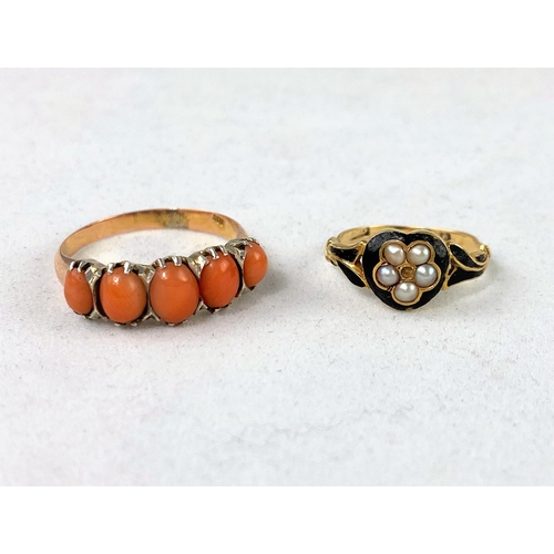 339 - A yellow metal dress ring set 5 graduating oval coral stones, stamped '9ct', 2.7 gm; a child's yello... 