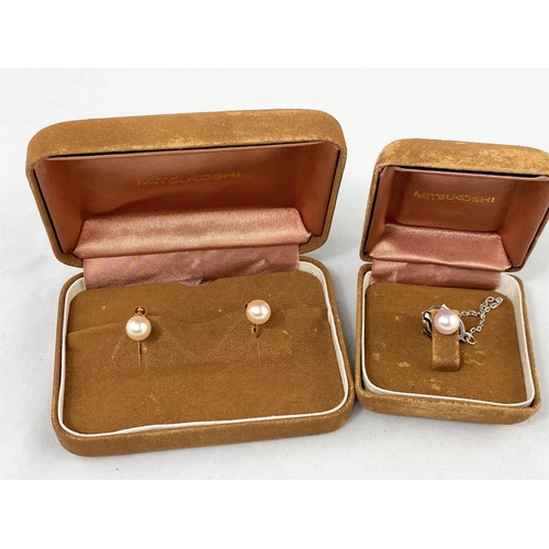 353 - A pair of yellow metal and pearl earrings, stamped 'K18'; a pearl tiepin
