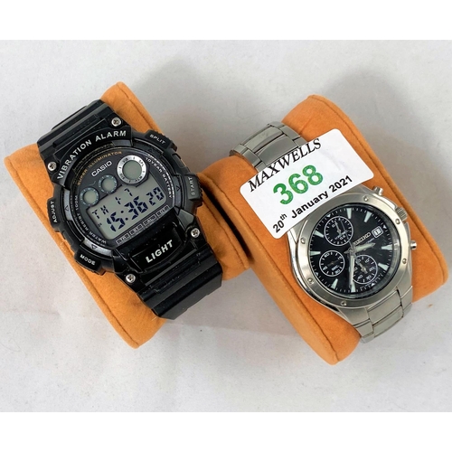 368 - A Seiko chronograph wristwatch; a Casio Vibration Alarm digital watch; an 8 compartment display case