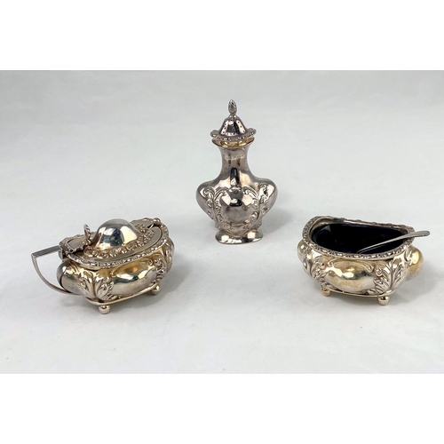 398 - A Georgian style 3 piece hallmarked silver cruet of rounded rectangular form, with lobed and embosse... 