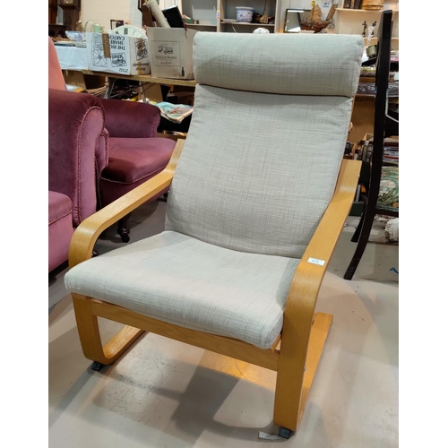 479 - A modern Ikea arm chair in lightwood and cream fabric