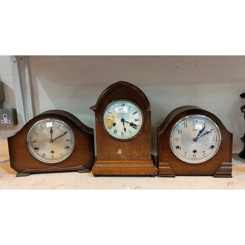 499 - An Edwardian mantel clock in oak lancet top case; 3 Westminster chiming mantel clocks