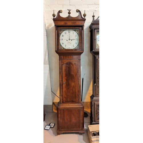 512 - An early 19th century inlaid mahogany longcase clock with brass finials and square reeded columns to... 