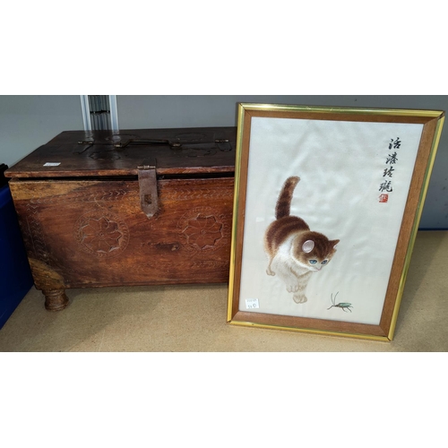 54D - A Chinese silk picture of kitten stalking an insect, 28 x 18cm; a carved wooden box