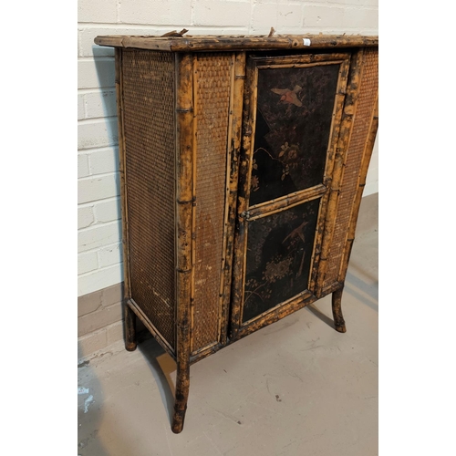 688 - A Japanese side cabinet with single door, lacquer decoration of birds