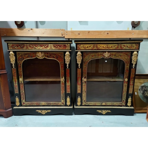 690 - A 19th century pair of red boule and and contra boule ebonised pier cabinets, with ormolu mounts, ea... 