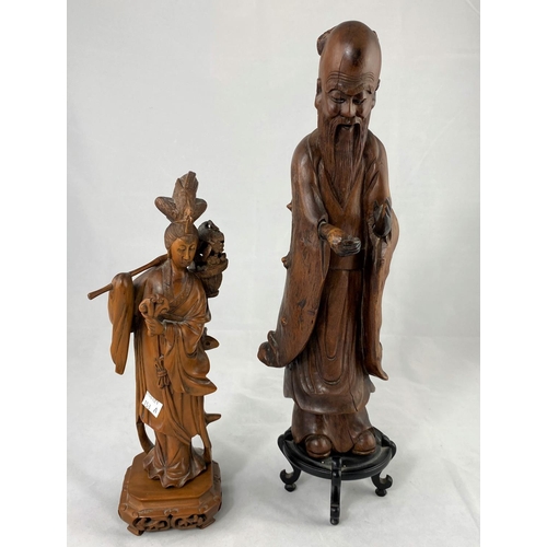 153a - Two Chinese carved wooden figures, 1 of a male sage, the other a lady carrying flowers, 35cm and 29c... 