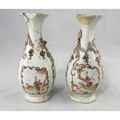 154a - A pair of Chinese vases with relief panel decoration of flowers and vines, height 17cm (damaged and ... 