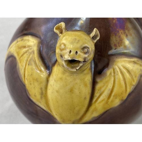 156A - An unusual Chinese tea pot depicting bat at night, its mouth being the spout, a branch the handle, 3... 