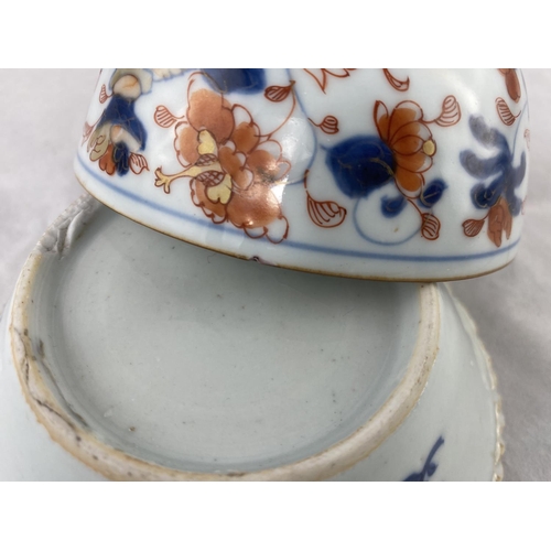 160A - A Chinese ceramic bowl decorated with flowers, diameter 11cm and another small blue and white dish