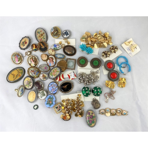 362 - A selection of costume brooches and earrings