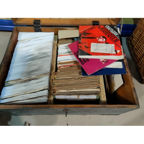 27 - A large collection of mid/late 20th century single records contained in a wooden box