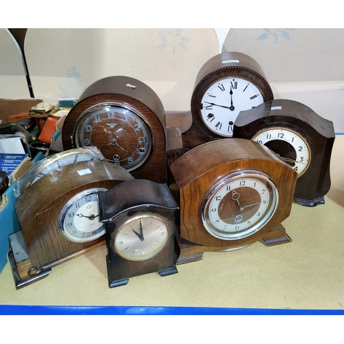 35 - Six 1930's mantel clocks in oak and stained wood cases