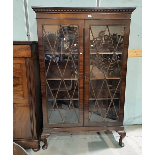 465 - A 1920's mahogany Georgian style display cabinet enclosed by astragal glazed doors, on short cabriol... 