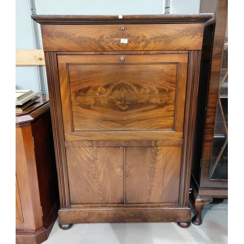 552 - A 19th century figured mahogany secretaire in the Biedermeier style, with frieze drawer, fall front ... 