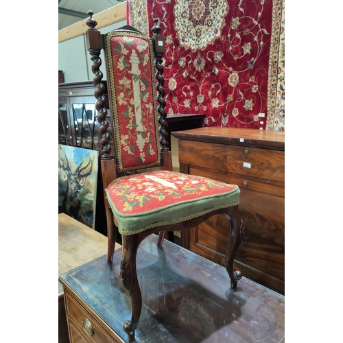 682 - A Victorian walnut occasional chair with barley twist columns, high back, needlework upholstery, on ... 