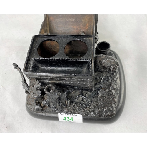 434 - A bronze 19th century style pen and ink stand in the form of a dog kennel with cat on roof, length 7... 