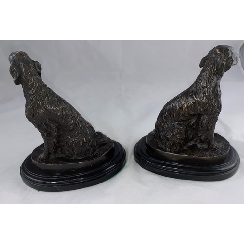 437 - After Barrie:  a modern bronze pair of animalier figures, seated setter dogs, height 19