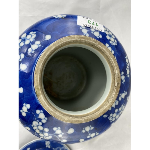 173 - A Chinese covered baluster jar in blue and white prunus blossom, height 26 cm