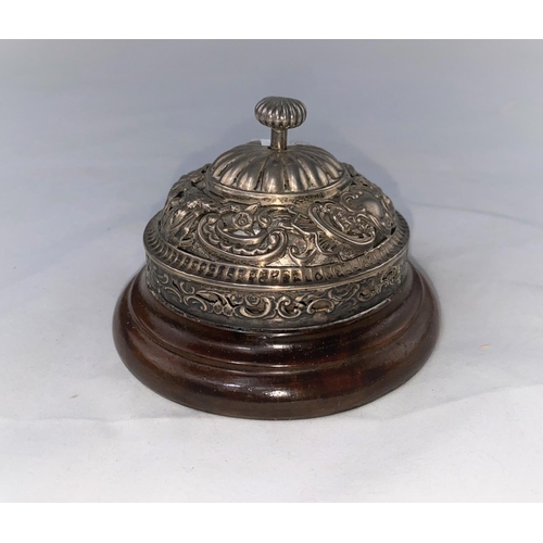 396 - An early 20th century table bell, silver mounted with turned wood base, 10 cm; 2 silver cased hand m... 