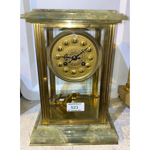 523 - A 4 glass mantel clock in green onyx and gilt case, filigree centre dial, French drum movement and m... 