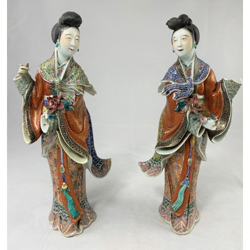 164a - A pair of finely decorated ceramic Chinese women in traditional clothing, height 30cm, both a.f.