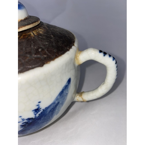 203 - Two Chinese blue & white teapots; a similar helmet shaped cream jug; a teacup and saucer with 4 char... 