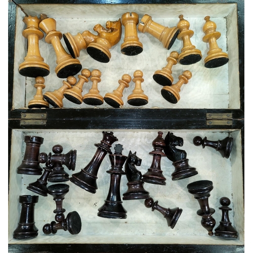124 - A 19th century stained wood chess set, king 9 cm, and a folding box/board, 30 cm