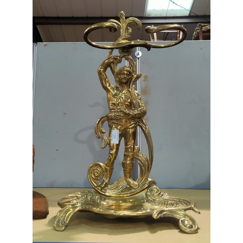 131 - A brass figural stick stand in the Victorian style, 60 cm
