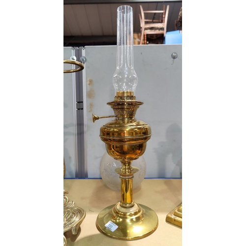133 - A Victorian style brass oil lamp , 66 cm overall