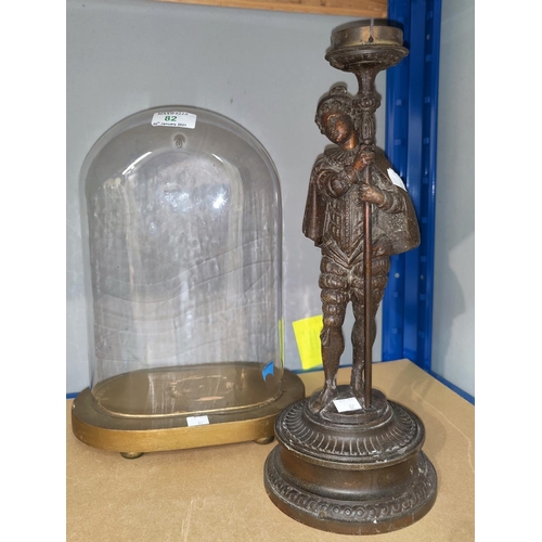 82 - A 19th century lamp base in bronzed finish, depicting a boy holding a torchère, height 34 cm; a 19th... 