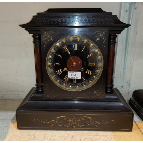 494 - A 19th century mantel clock in black marble architectural case, with turned side columns and incised... 