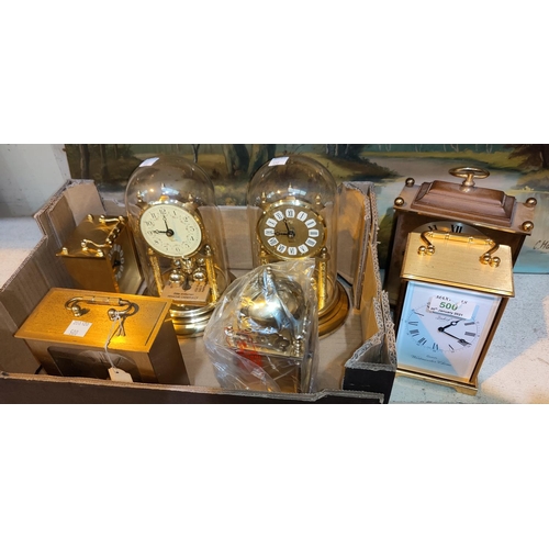 500 - Four reproduction carriage clocks; a reproduction lantern clock; 4 x 400 day clocks