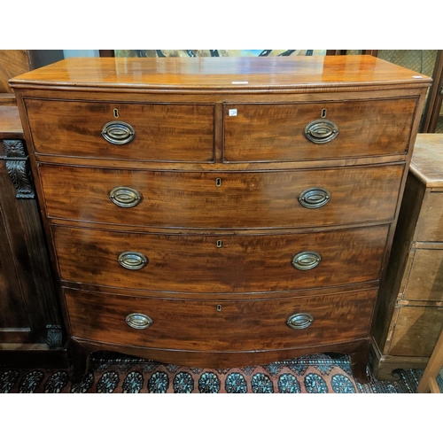 554 - A Georgian mahogany bow front chest of 3 long and 2 short drawers with brass oval drop handles, on s... 