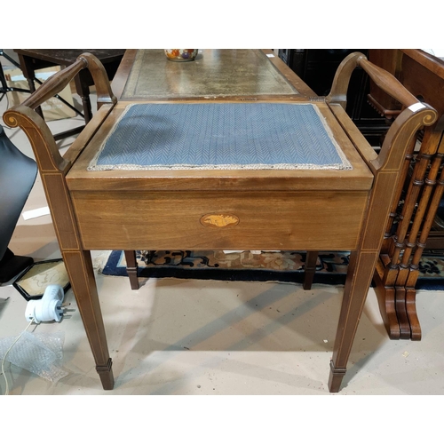 568 - An Edwardian inlaid mahogany piano stool with box seat
