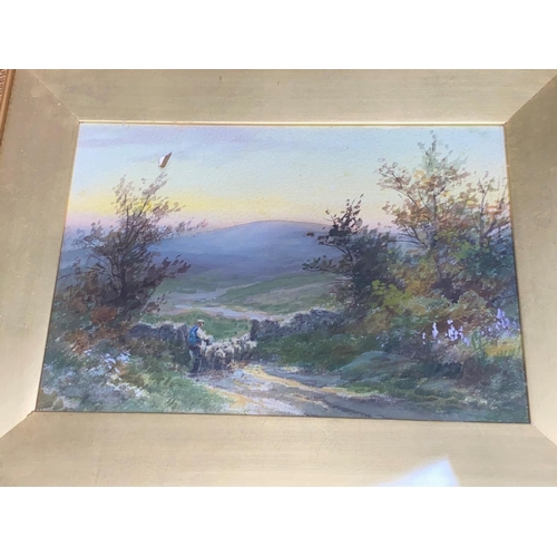 400 - A pair of water colours of sheep in landscape settings, one signed indistinctly, gilt framed and gla... 