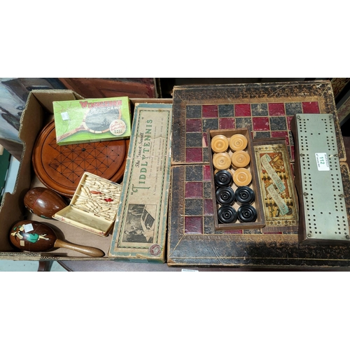 112 - A Victorian folding backgammon board, leather covered, with a set of boxwood discs; a selection of v... 
