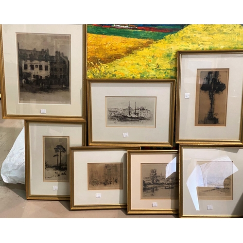 425 - A collection of  early 20th century etchings, framed and glazed
